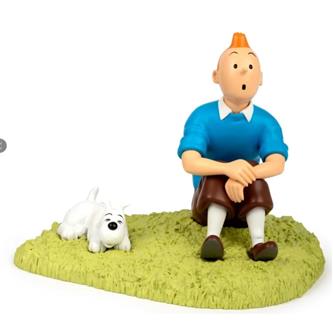 Tintin og Terry sidder i græsset
